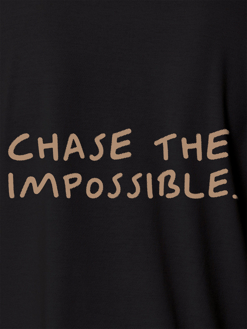 Close up of 'Chase The Impossible' design on Men's Dark Grey Polo T-shirt, highlighting intricate details and vibrant print.