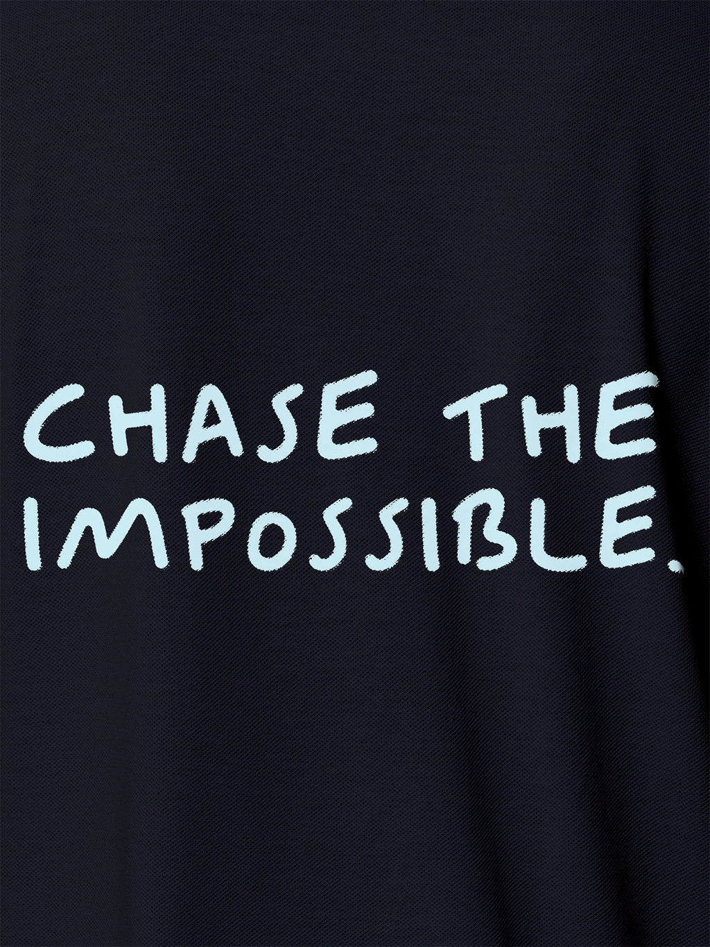 Close up of 'Chase The Impossible' design on Men's Navy Blue Polo T-shirt, highlighting intricate details and vibrant print.