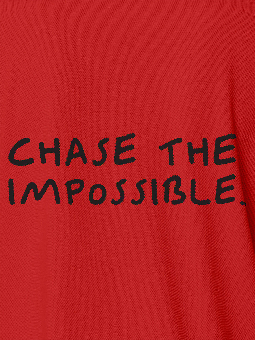 Close up of 'Chase The Impossible' design on Men's Red Polo T-shirt, highlighting intricate details and vibrant print.