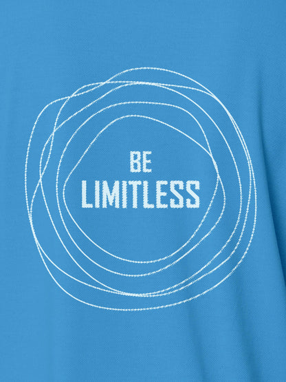 Close up of 'Be Limitless' design on Men's Blue Polo T-shirt, highlighting intricate details and vibrant print.