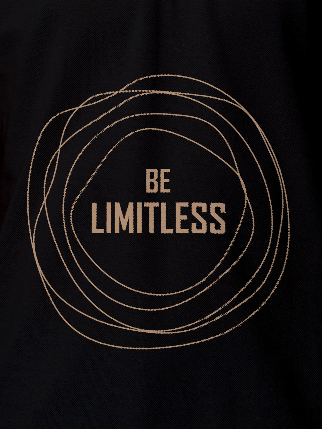 Close up of 'Be Limitless' design on Women's Black Polo T-shirt, highlighting intricate details and vibrant print.