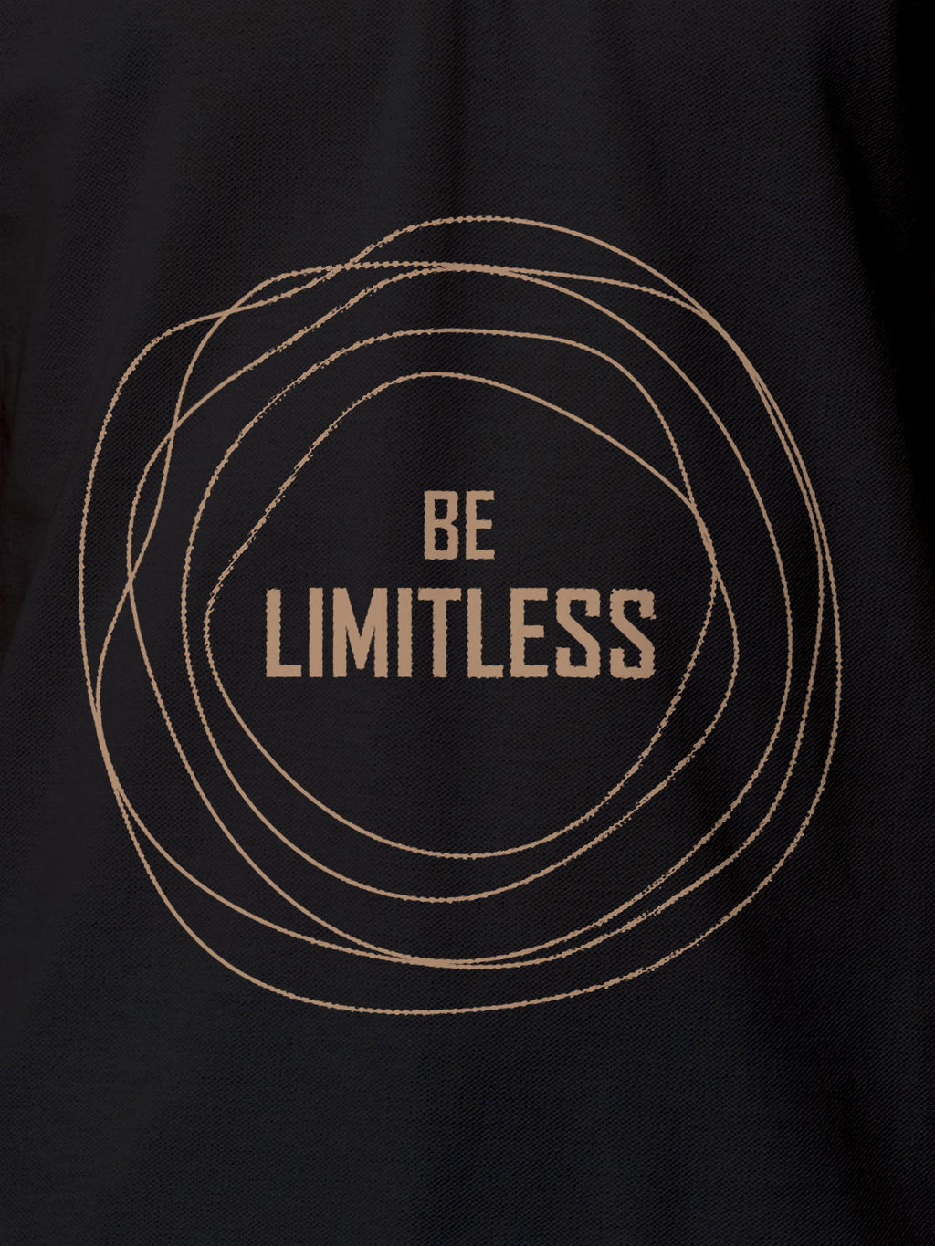 Close up of 'Be Limitless' design on Women's Dark Grey Polo T-shirt, highlighting intricate details and vibrant print.