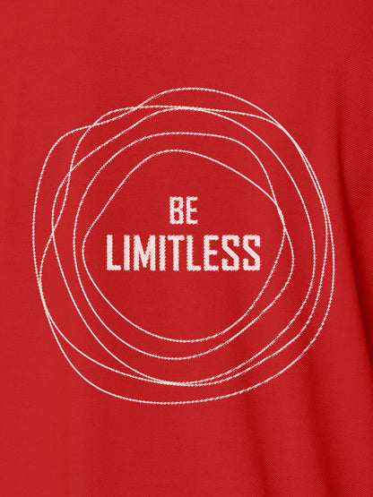 Close up of 'Be Limitless' design on Men's Red Polo T-shirt, highlighting intricate details and vibrant print.