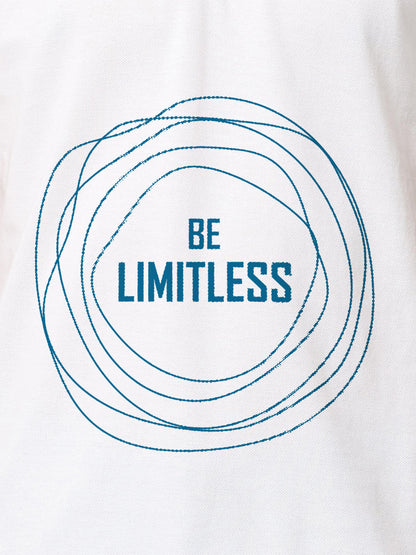 Close up of 'Be Limitless' design on Women's White Polo T-shirt, highlighting intricate details and vibrant print.